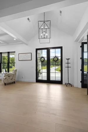 a living room with furniture fireplace and a flat screen tv