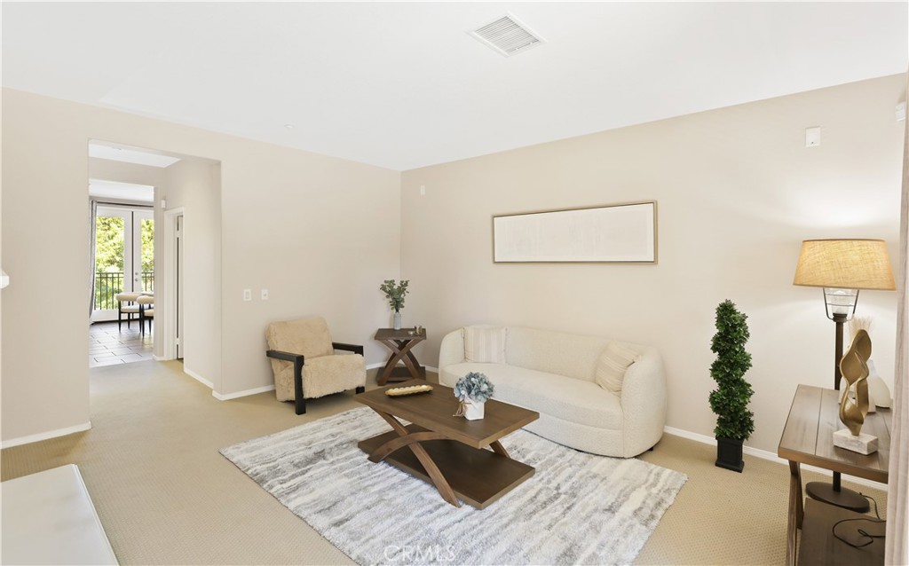 23 Crosspointe Irvine, CA 92618 - Photo 19 of 47 a living room with furniture and a couch