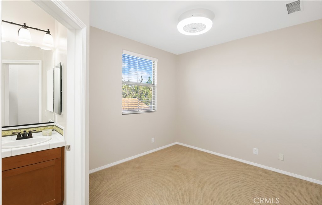 23 Crosspointe Irvine, CA 92618 - Photo 23 of 47 a view of an empty room with closet and a window