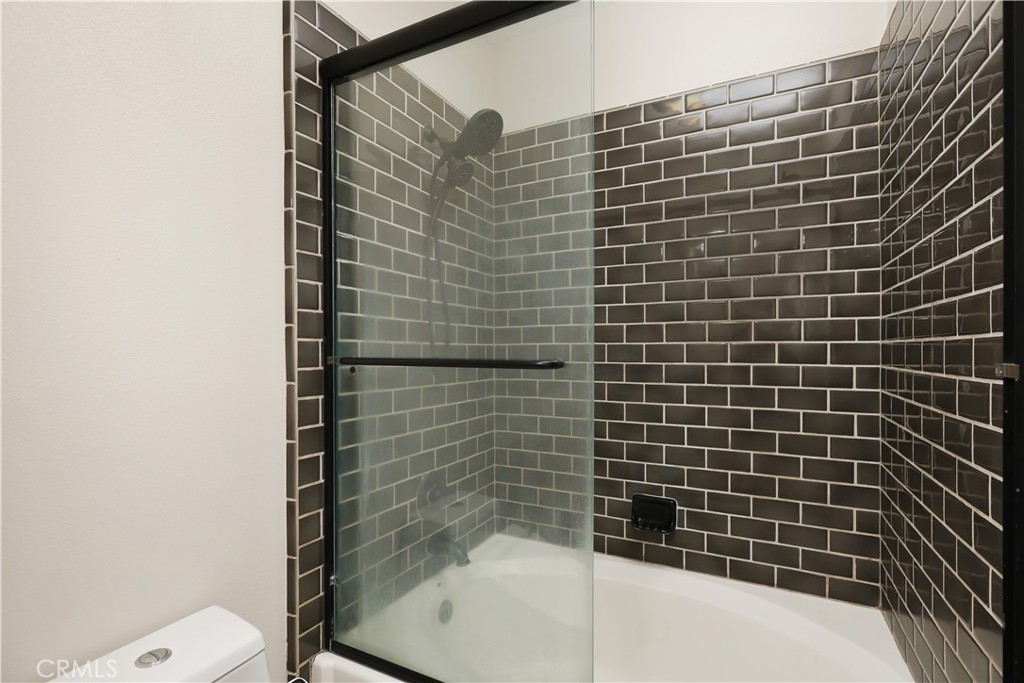 23 Crosspointe Irvine, CA 92618 - Photo 32 of 47 a bathroom with a shower