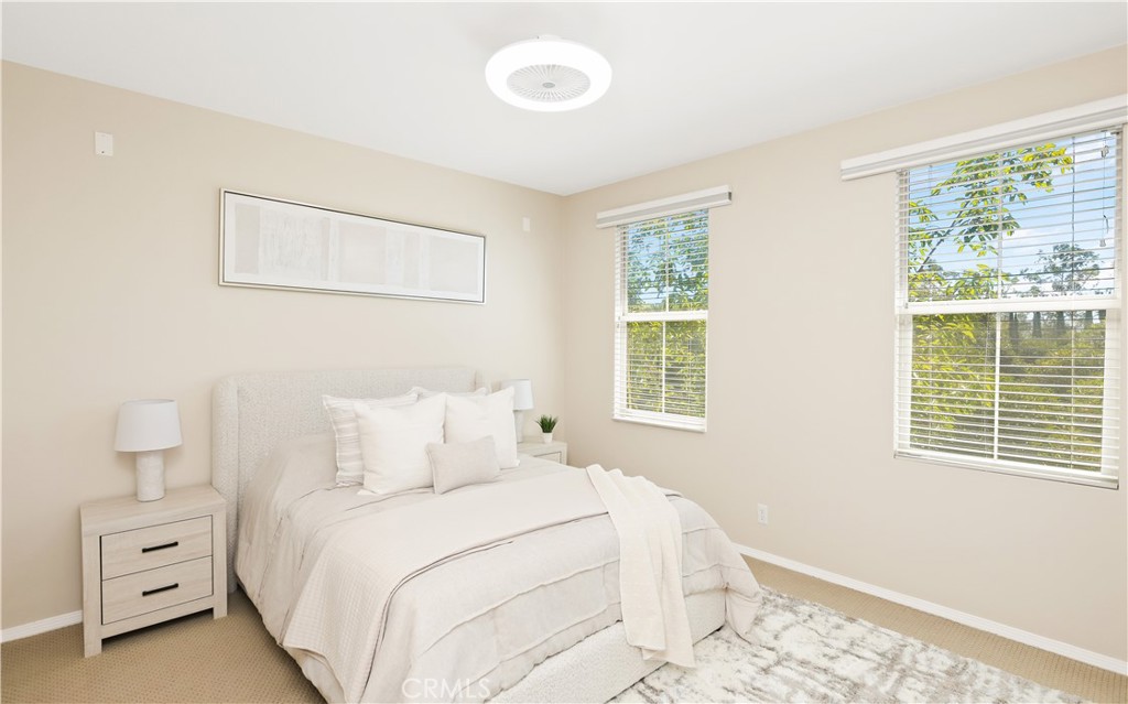 23 Crosspointe Irvine, CA 92618 - Photo 4 of 47 a bedroom with a bed and a window