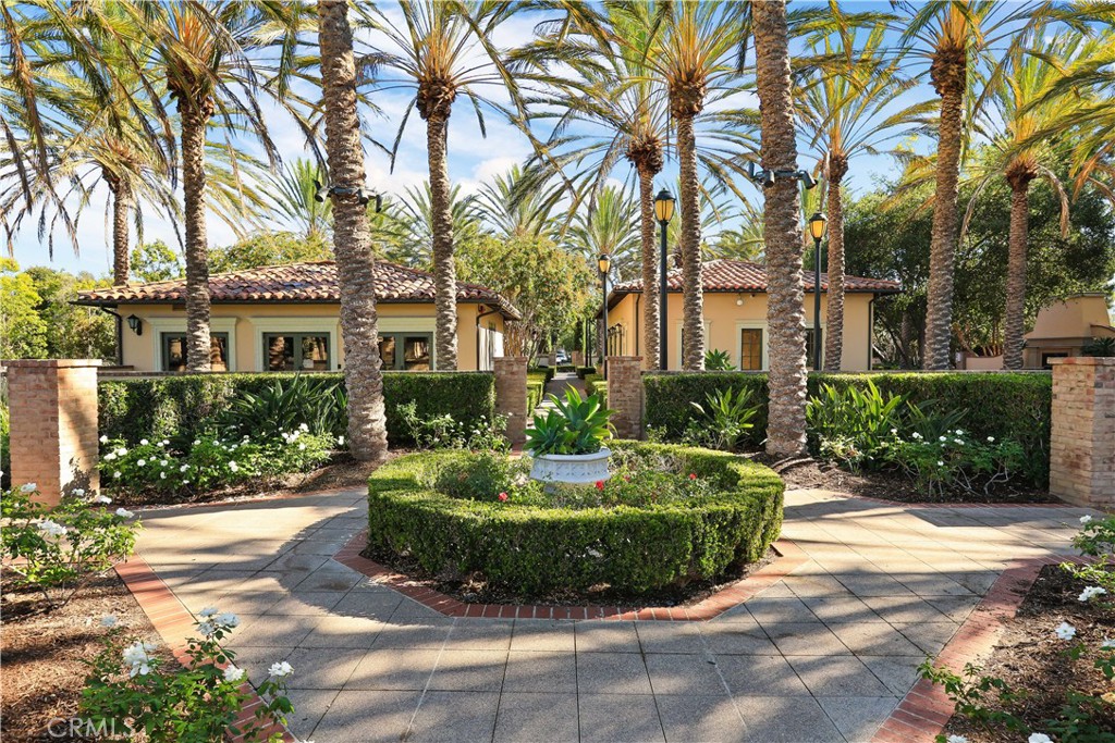 23 Crosspointe Irvine, CA 92618 - Photo 46 of 47 a front view of a house with a garden
