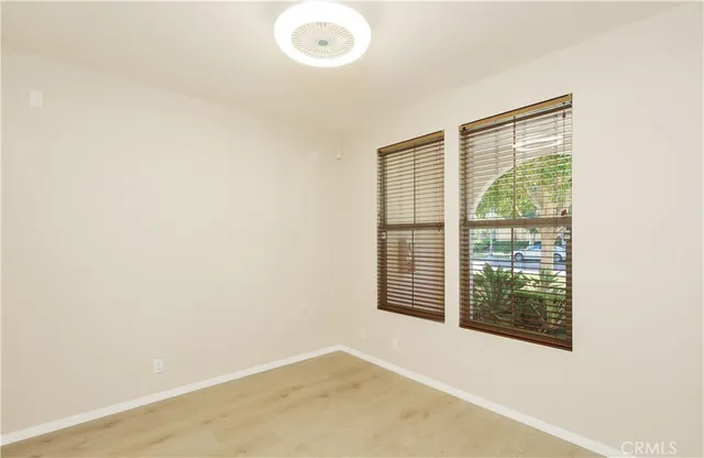 an empty room with windows