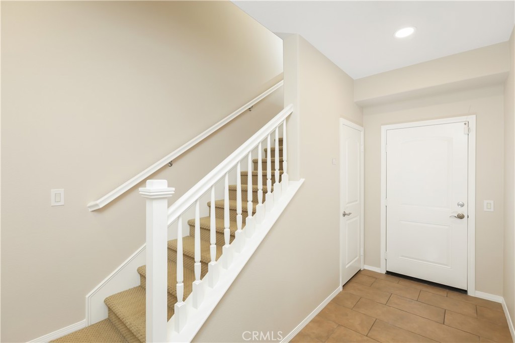 23 Crosspointe Irvine, CA 92618 - Photo 9 of 47 a view of an entryway with wooden floor