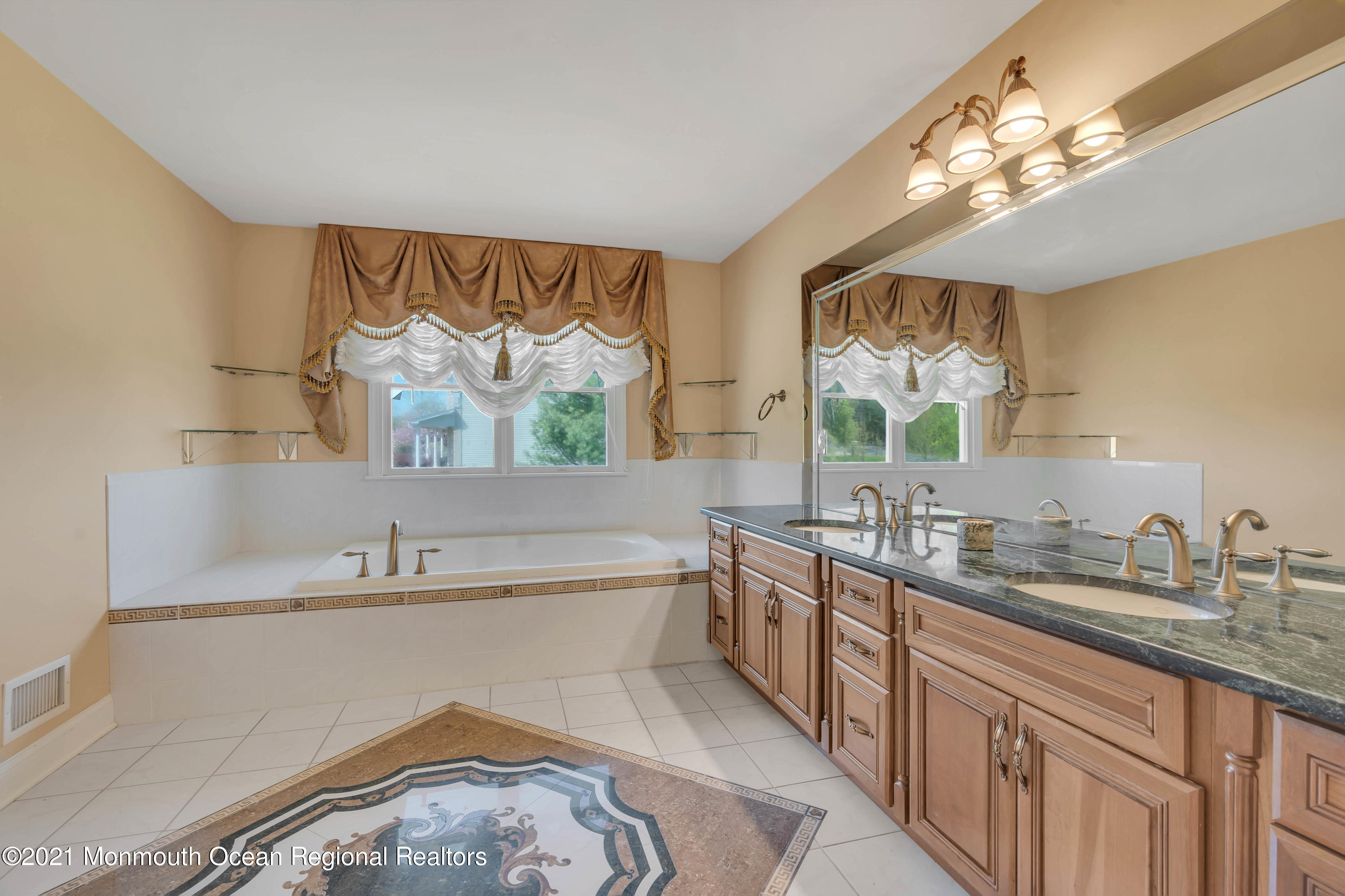 60 Yellow Meetinghouse Road Cream Ridge, NJ 08514 - Photo 16 of 33 a bathroom with a granite countertop sink mirror and a bathtub