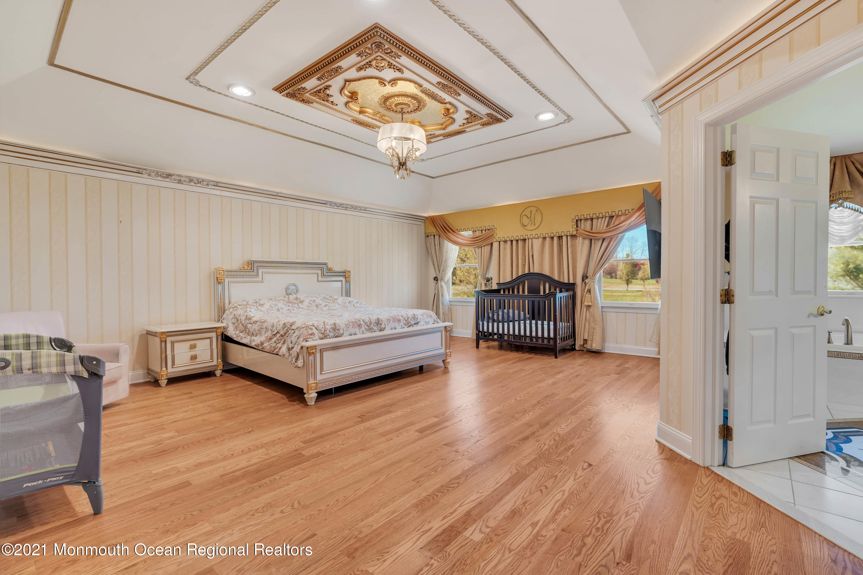 60 Yellow Meetinghouse Road Cream Ridge, NJ 08514 - Photo 17 of 33 a living room with furniture and a chandelier