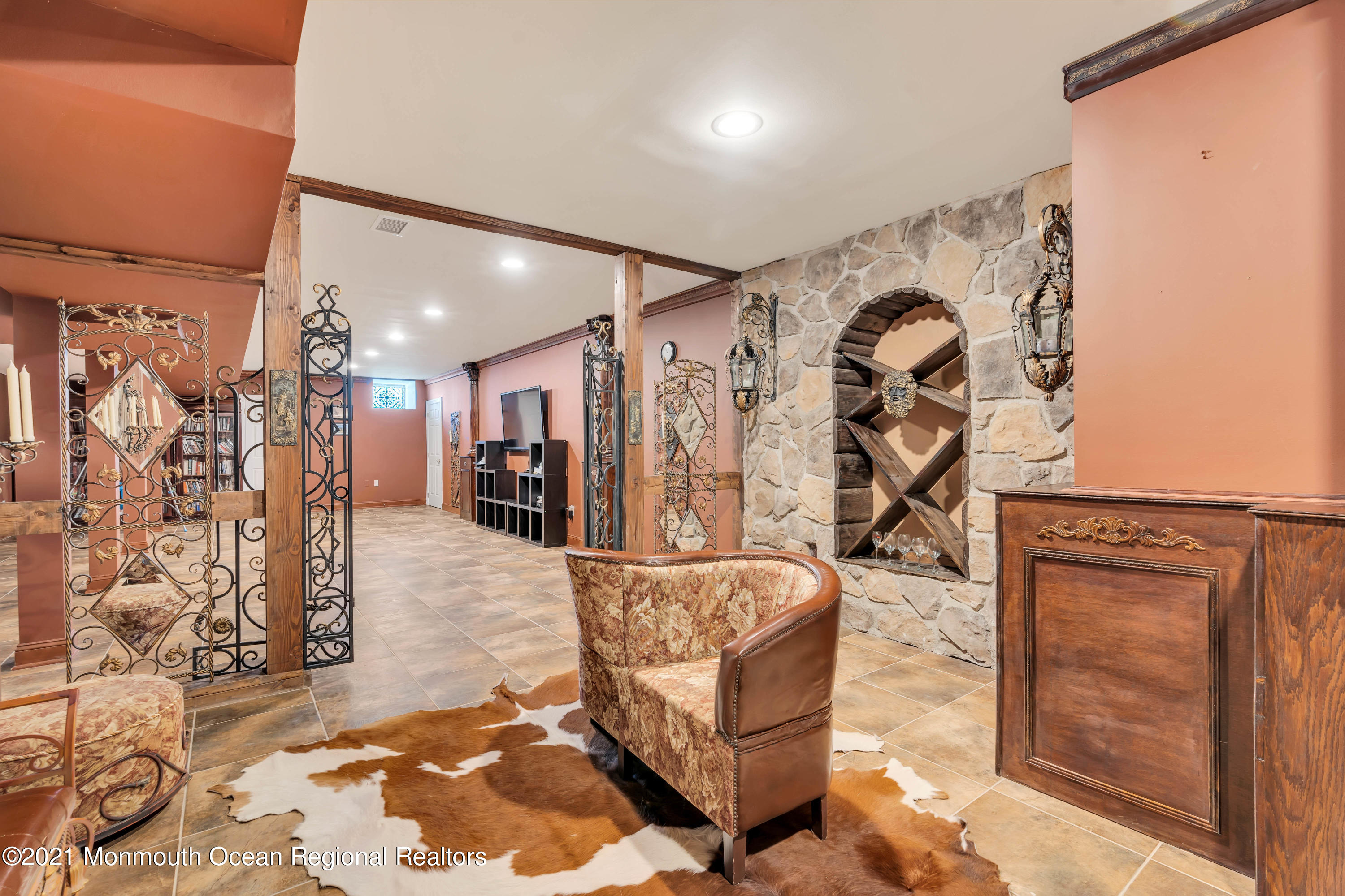 60 Yellow Meetinghouse Road Cream Ridge, NJ 08514 - Photo 25 of 33 a living room with furniture and a flat screen tv