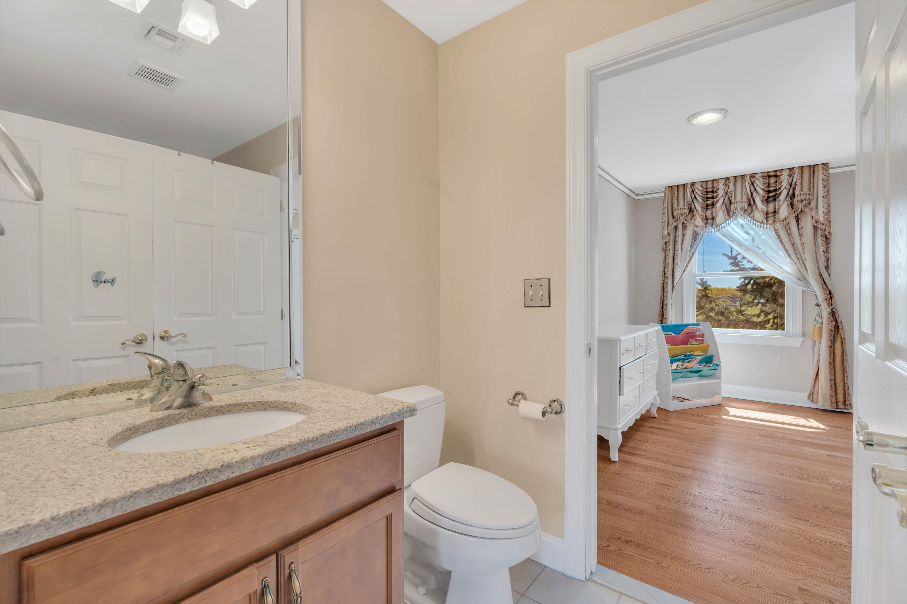 60 Yellow Meetinghouse Road Cream Ridge, NJ 08514 - Photo 31 of 33 a bathroom with a granite countertop sink toilet and a mirror