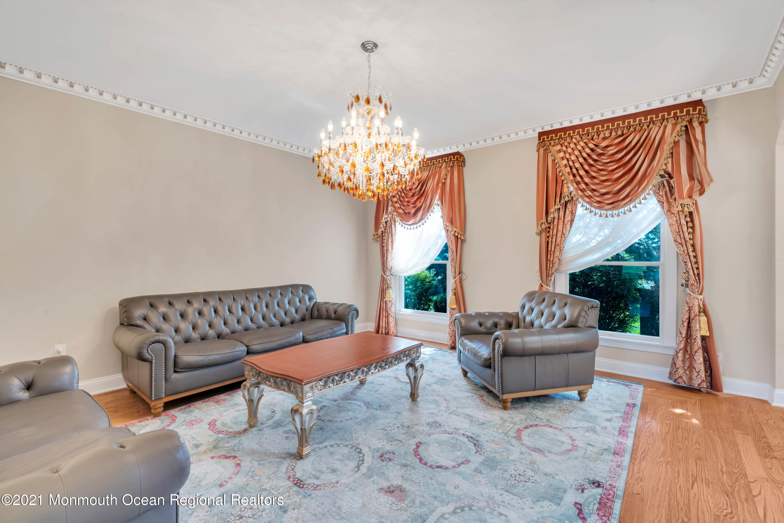 60 Yellow Meetinghouse Road Cream Ridge, NJ 08514 - Photo 32 of 33 a living room with furniture and a chandelier