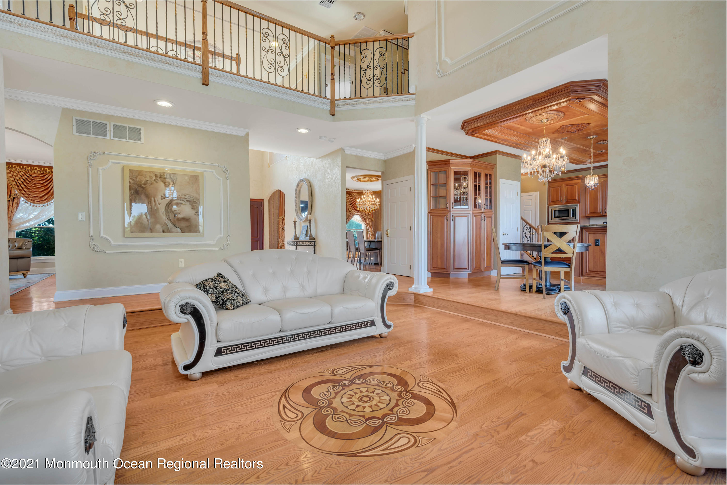 60 Yellow Meetinghouse Road Cream Ridge, NJ 08514 - Photo 7 of 33 a living room with furniture a couch and paintings on the wall