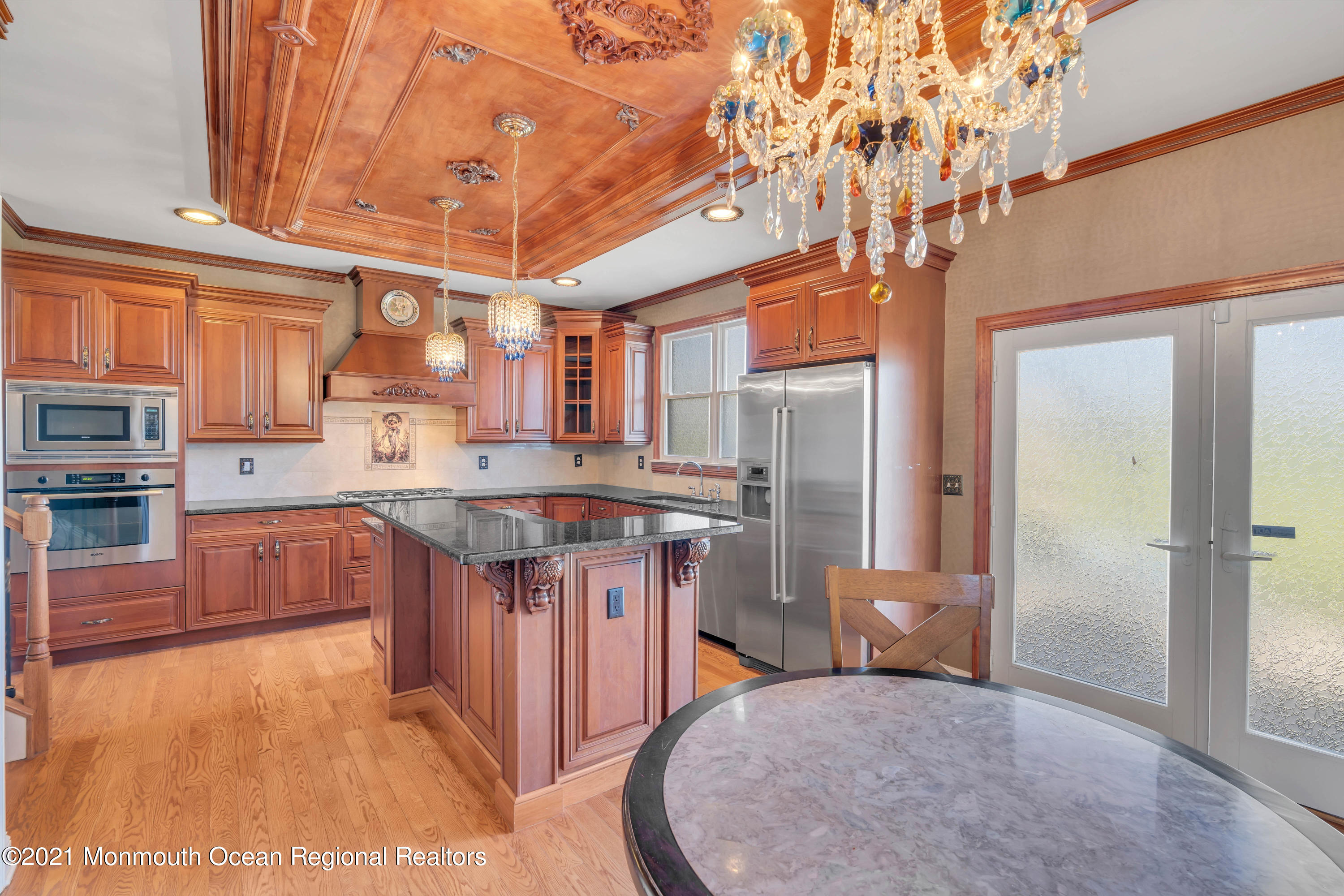 60 Yellow Meetinghouse Road Cream Ridge, NJ 08514 - Photo 9 of 33 a kitchen with stainless steel appliances granite countertop a sink a stove cabinets and wooden floor