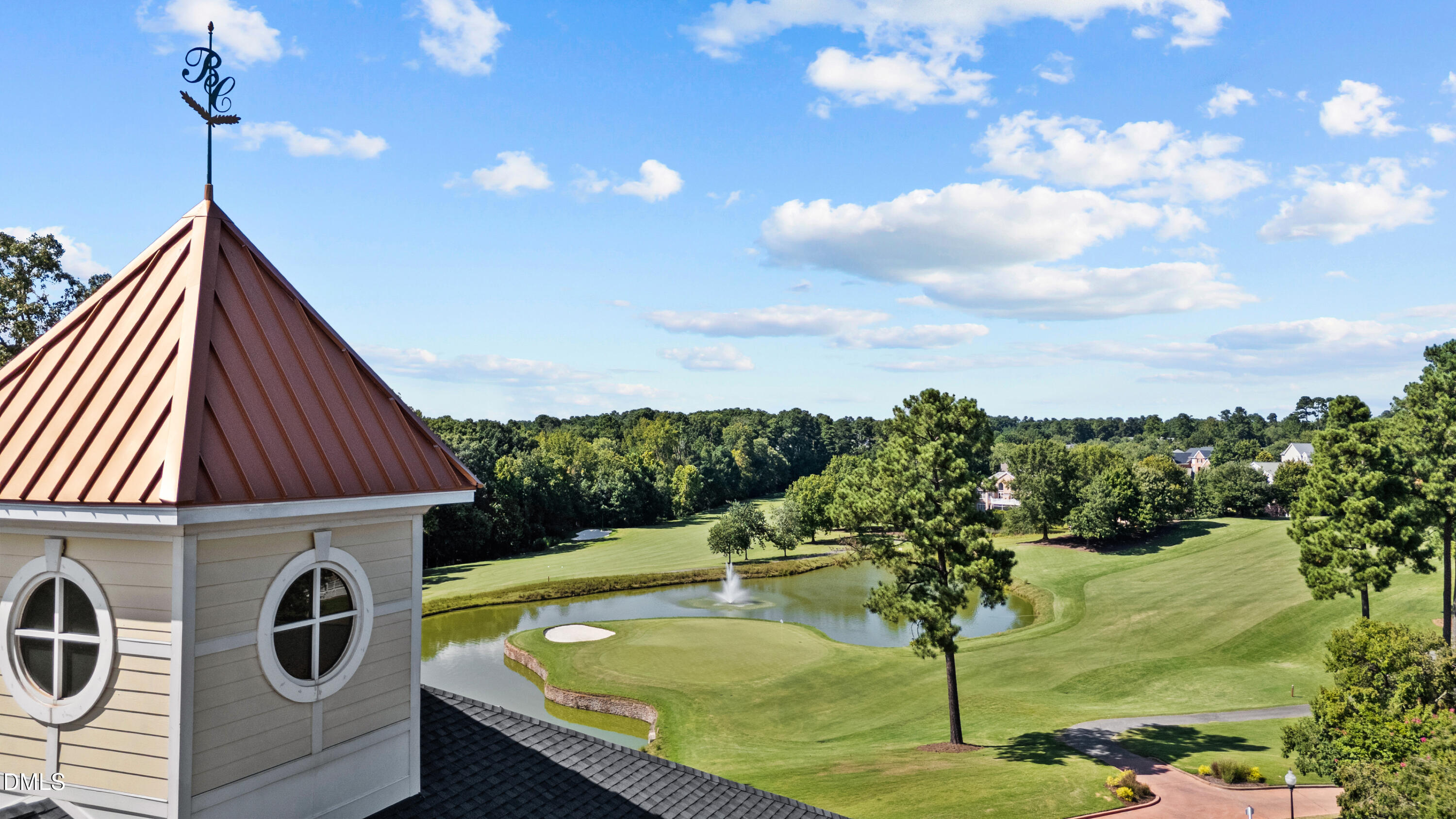 6108 Dunzo Drive Raleigh, NC 27617 - Photo 27 of 32 a view of a swimming pool with a garden
