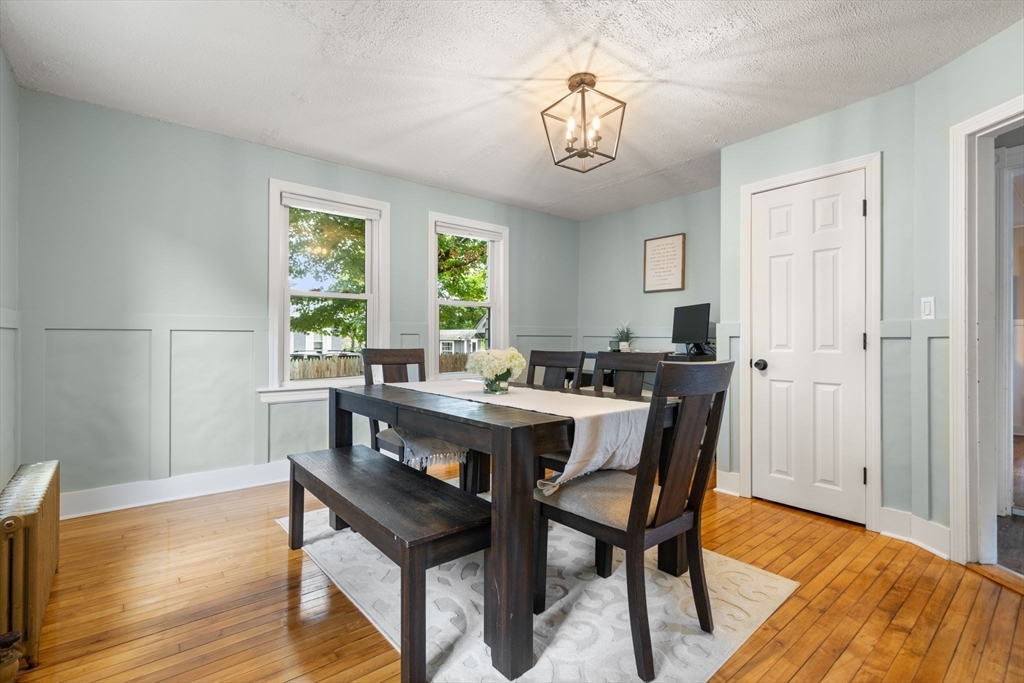 56 Ruggles Street Franklin, MA 02038 - Photo 21 of 42 a view of a dining room with furniture window and wooden floor