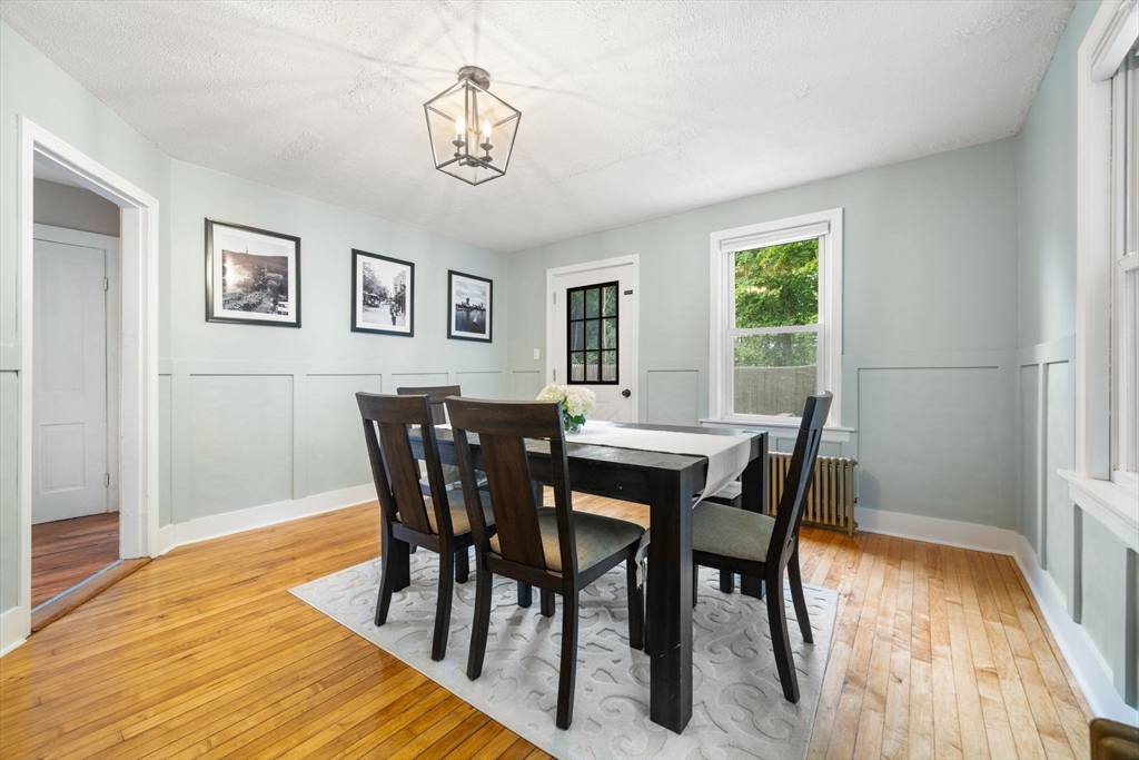 56 Ruggles Street Franklin, MA 02038 - Photo 22 of 42 a view of a dining room with furniture and wooden floor