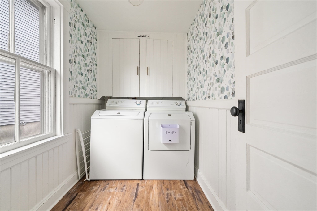 56 Ruggles Street Franklin, MA 02038 - Photo 23 of 42 a utility room with dryer and washer