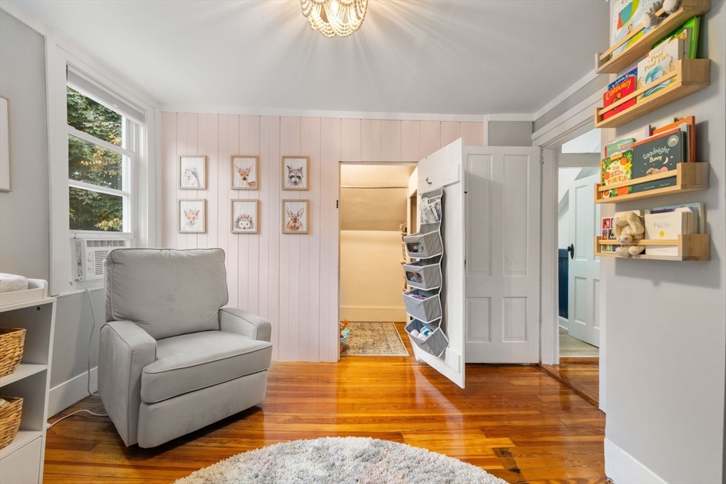 56 Ruggles Street Franklin, MA 02038 - Photo 28 of 42 a living room with furniture and a rug
