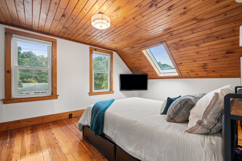 56 Ruggles Street Franklin, MA 02038 - Photo 32 of 42 a bedroom with bed and a large window