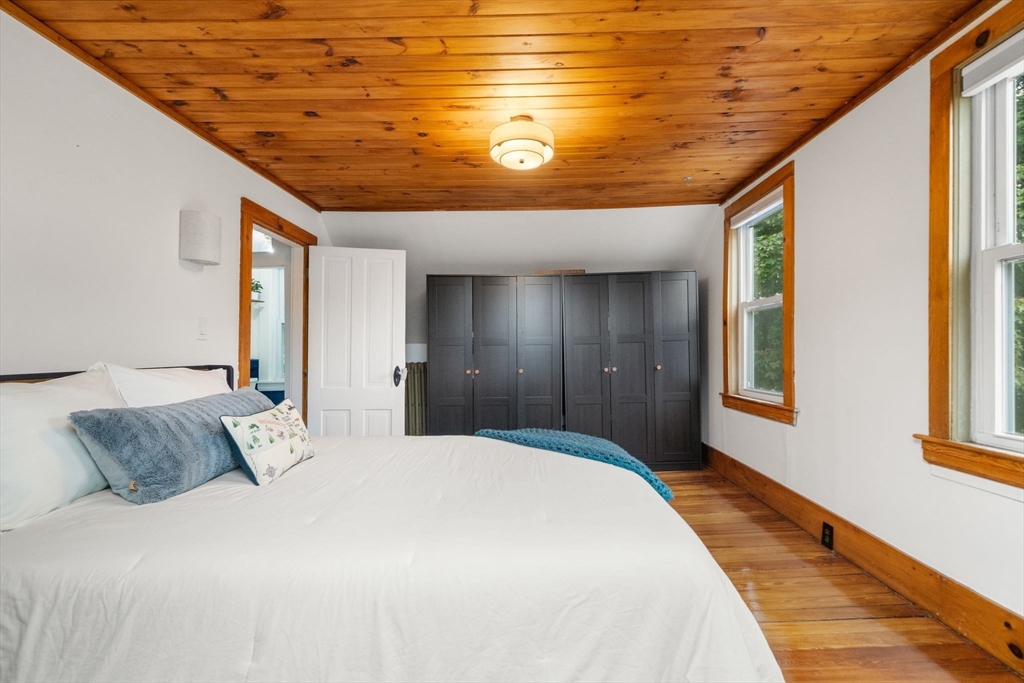 56 Ruggles Street Franklin, MA 02038 - Photo 34 of 42 a bedroom with a bed next to a window