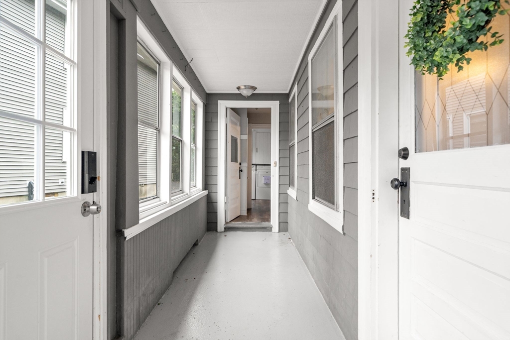 56 Ruggles Street Franklin, MA 02038 - Photo 6 of 42 a view of a house with a porch