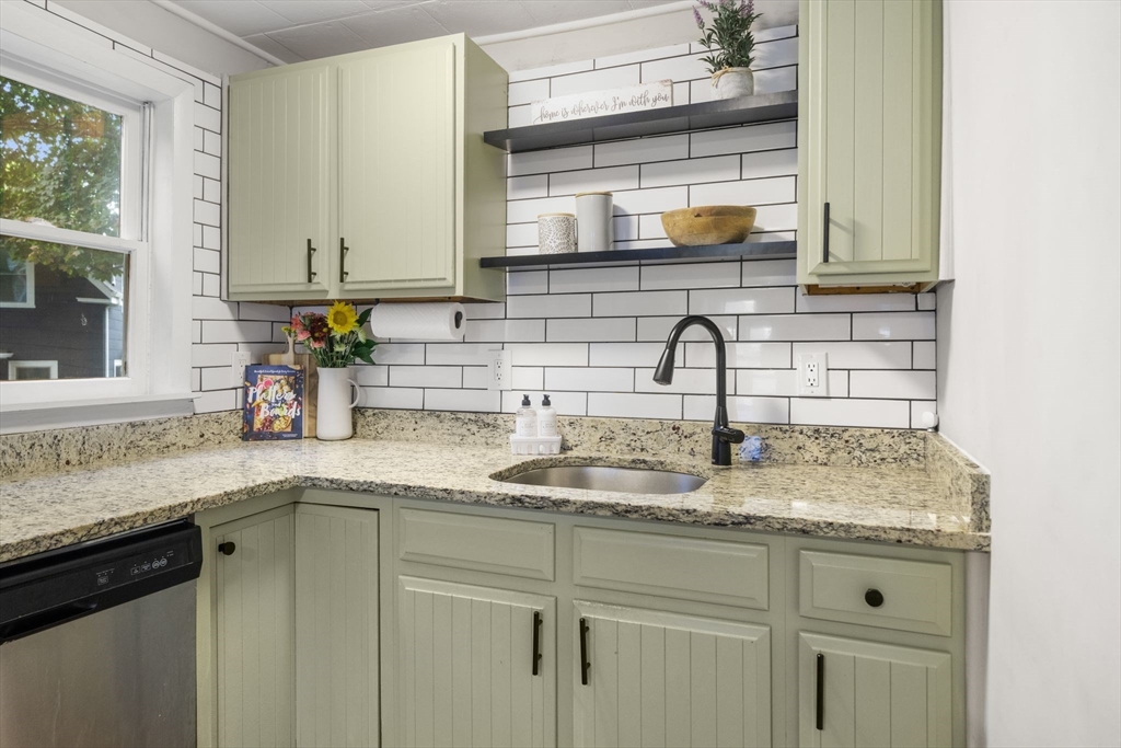 56 Ruggles Street Franklin, MA 02038 - Photo 10 of 42 a kitchen with sink and window