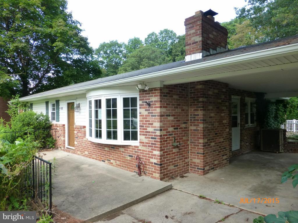 232 Bynum Ridge Road Forest Hill, MD 21050 - Photo 2 of 21 a front view of a house with a garage