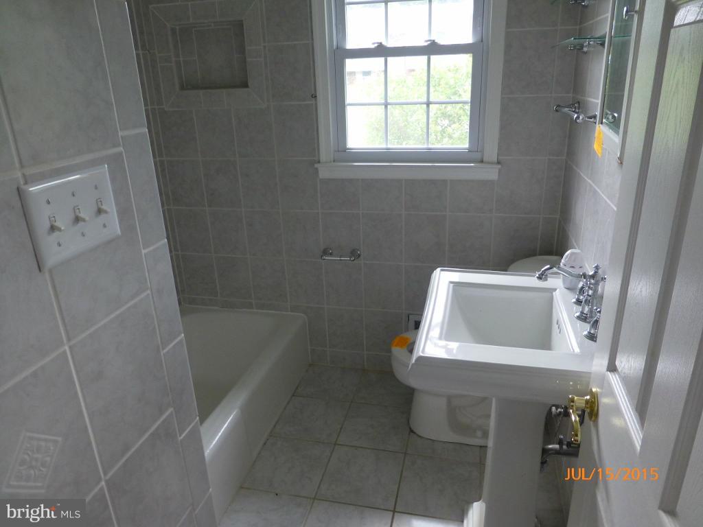 232 Bynum Ridge Road Forest Hill, MD 21050 - Photo 17 of 21 a bathroom with a sink toilet and shower