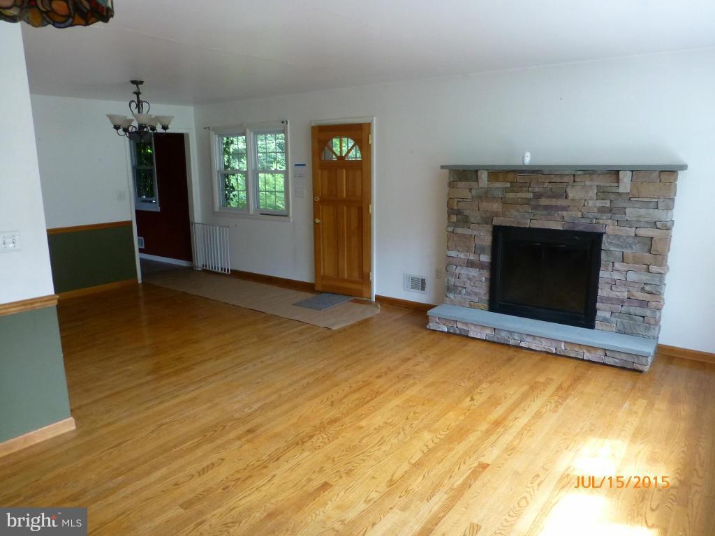 232 Bynum Ridge Road Forest Hill, MD 21050 - Photo 7 of 21 an empty room with windows and fireplace