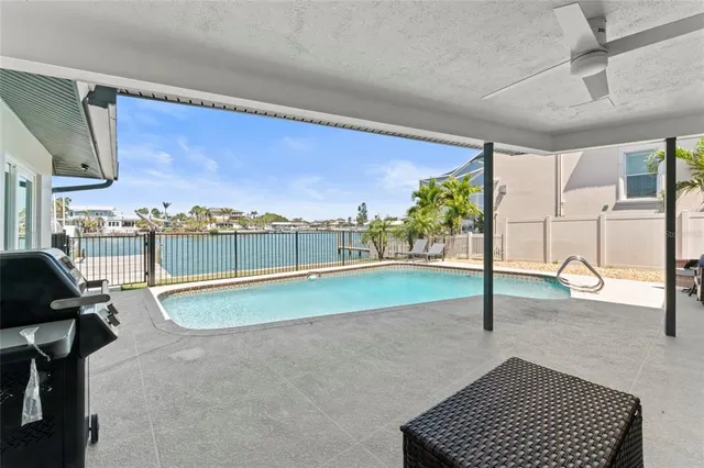 a view of a house with backyard porch and patio