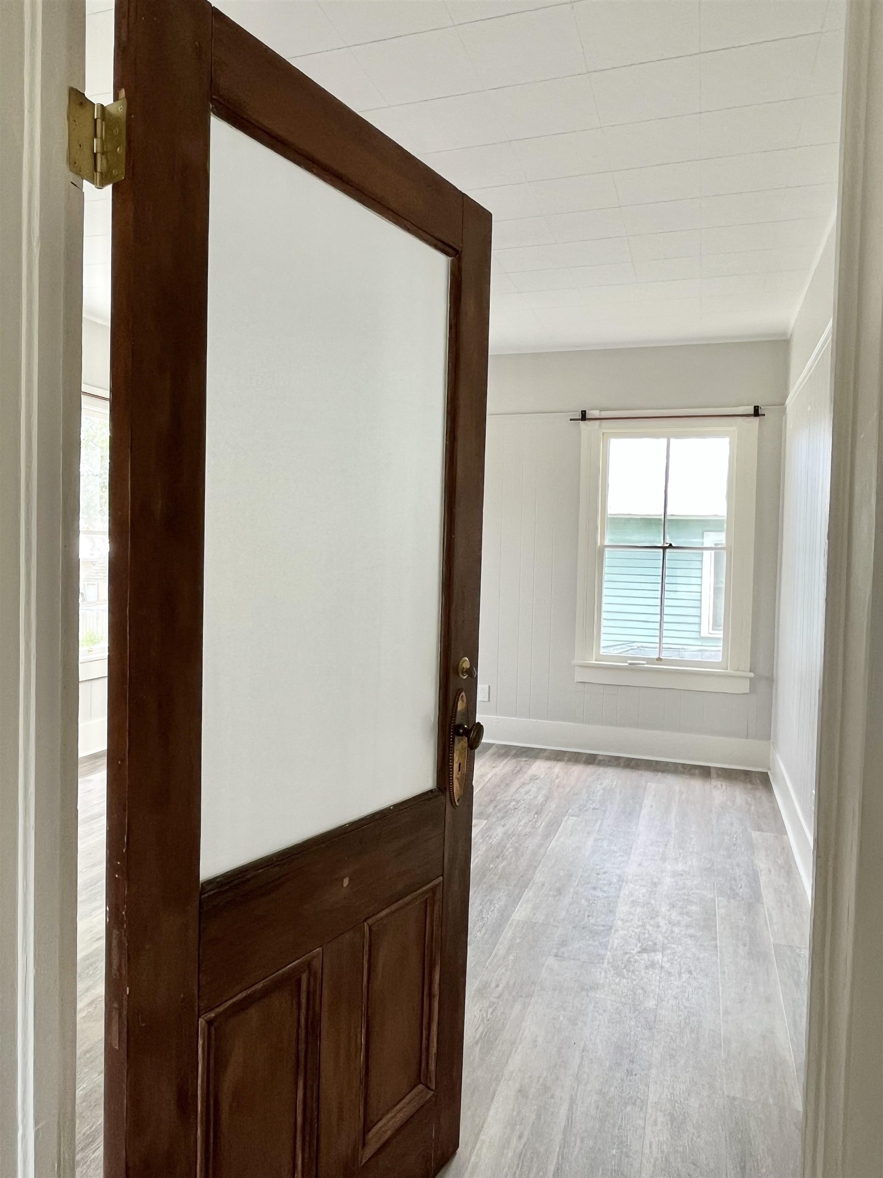 8 Rohde Avenue, Unit 4 St. Augustine, FL 32084 - Photo 11 of 18 a view of an empty room and window