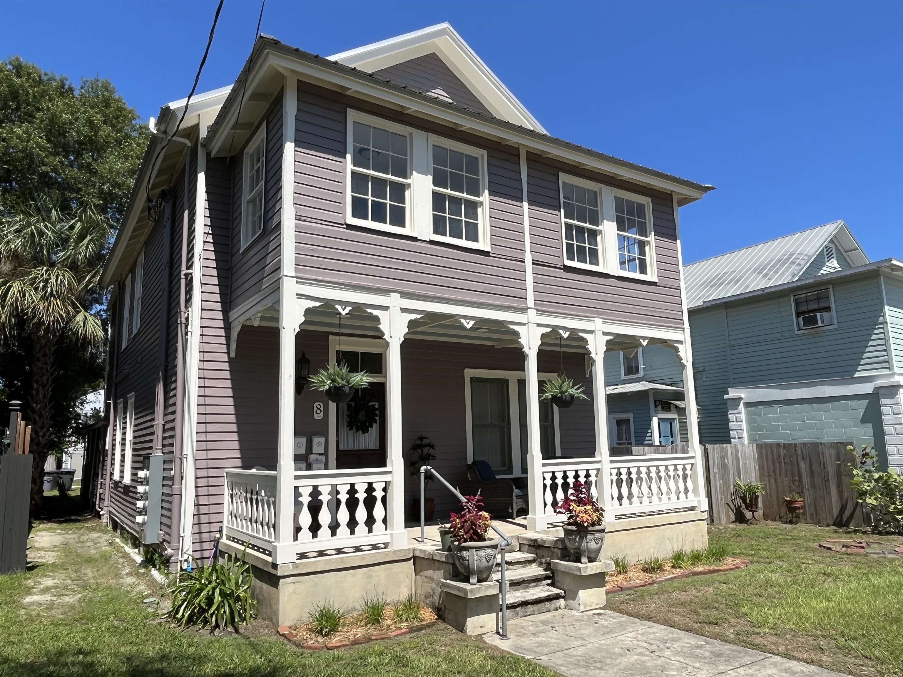 8 Rohde Avenue, Unit 4 St. Augustine, FL 32084 - Photo 3 of 18 View of front of house with a porch
