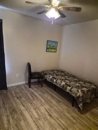 a view of a livingroom with a workspace