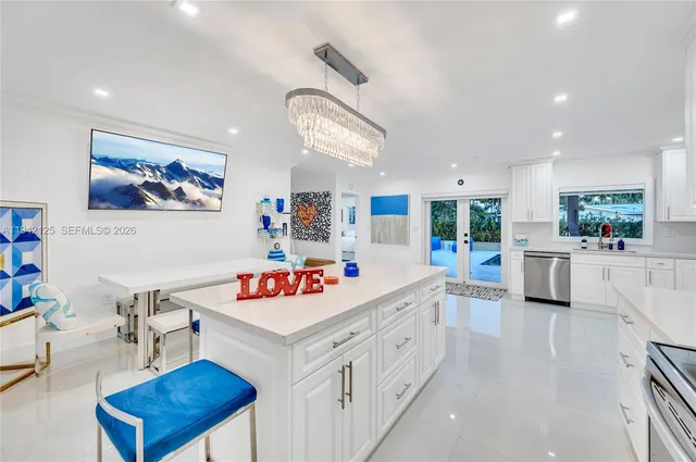 a bedroom with a bed and a lamp on table