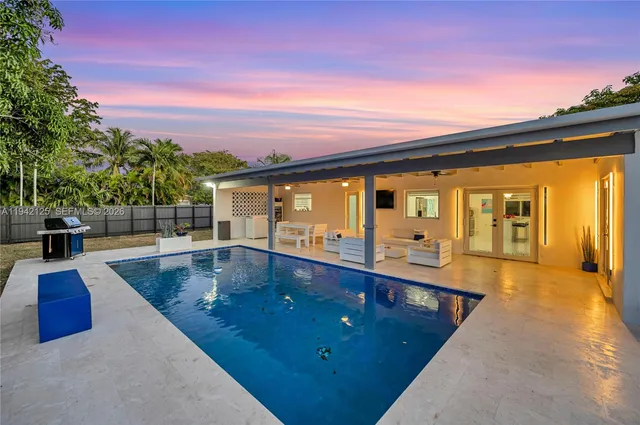a view of a park with large trees