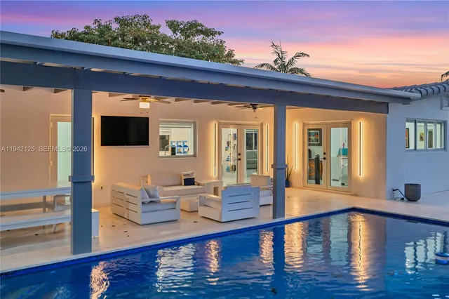 a view of a patio with swimming pool