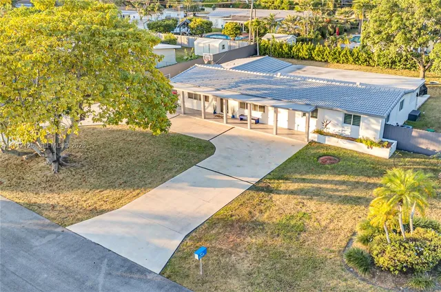 a bathroom with a sink and a large mirror