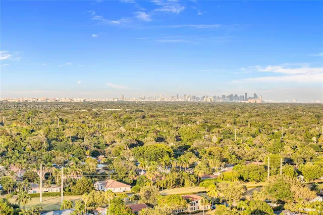 a black and white photo of a open kitchen