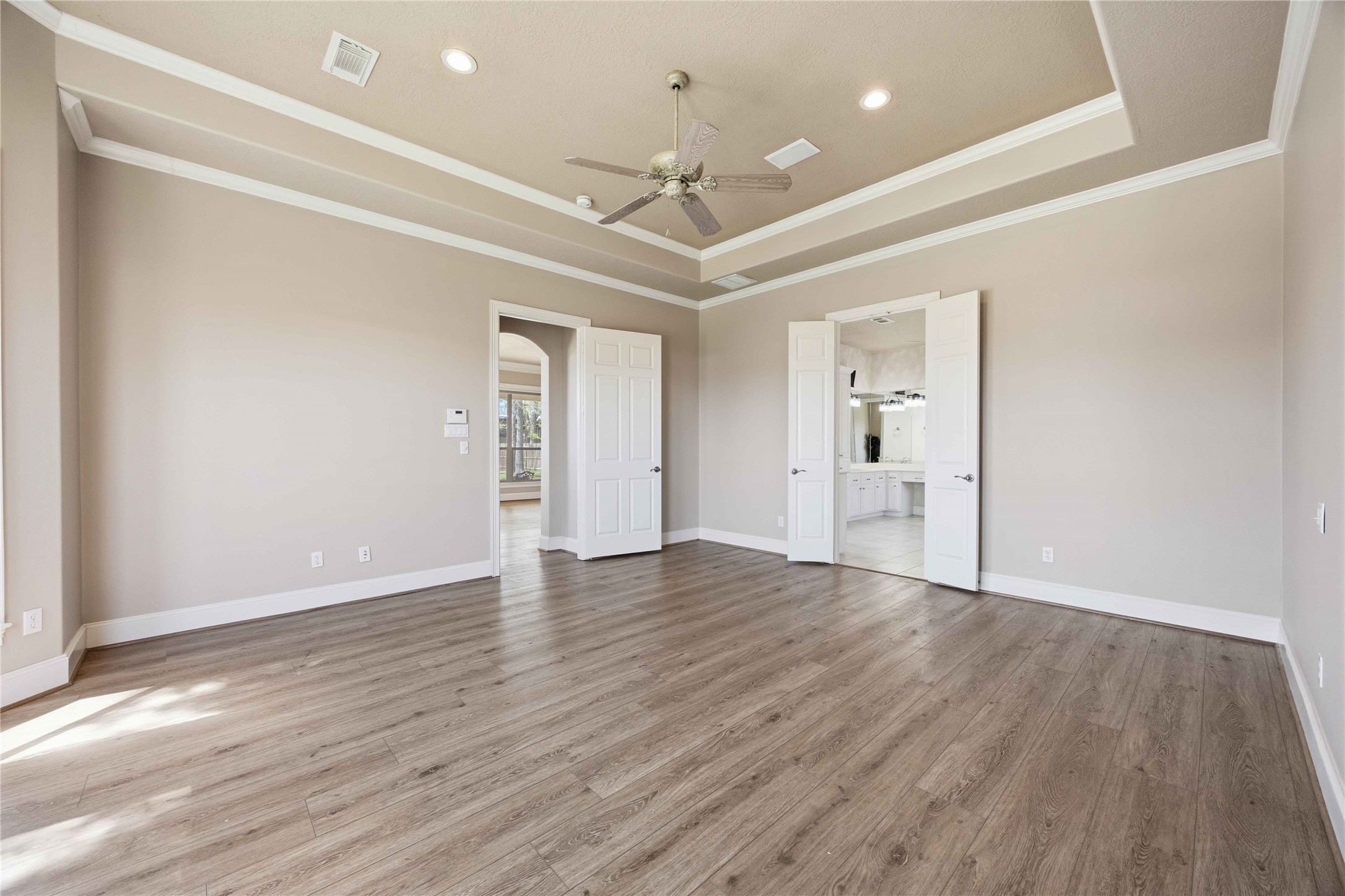 1930 Old River Road Montgomery, TX 77356 - Photo 21 of 49 Another view of the primary suite shows the incredible amount of space you have to work with. Double doors open to the primary bath.