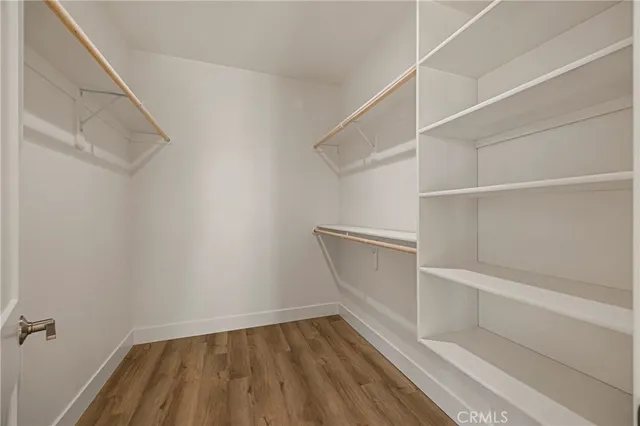 a view of an empty walk in closet