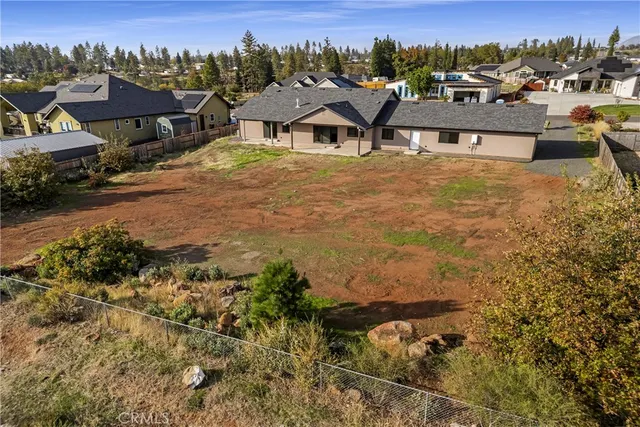 a view of a town with mountains in the background