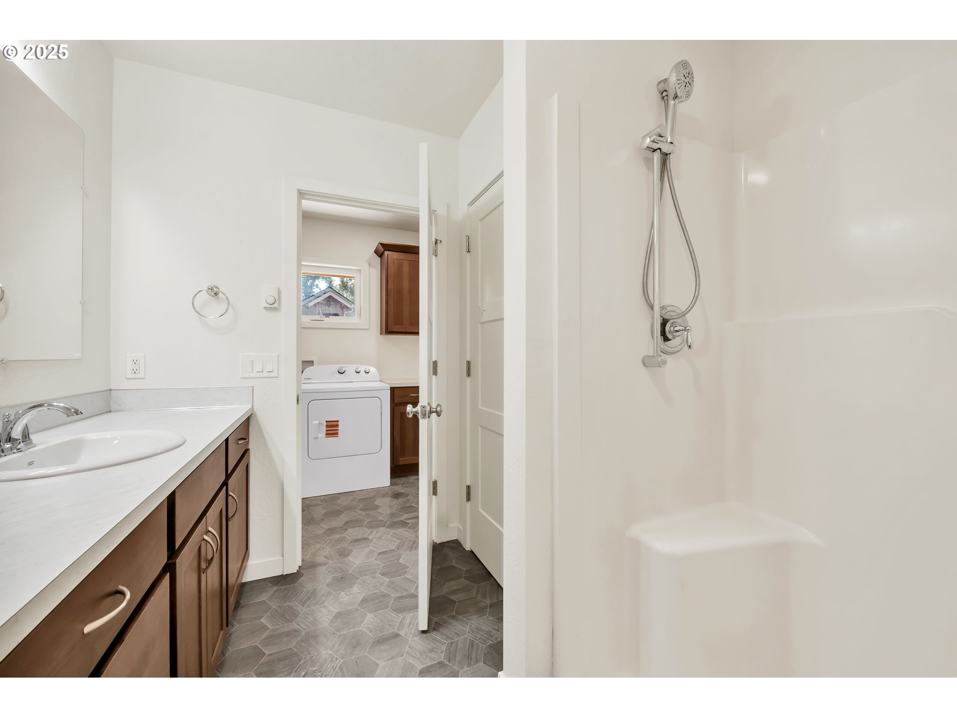 38286 Camp Creek Road Springfield, OR 97478 - Photo 26 of 48 a bathroom with a sink a vanity and shower