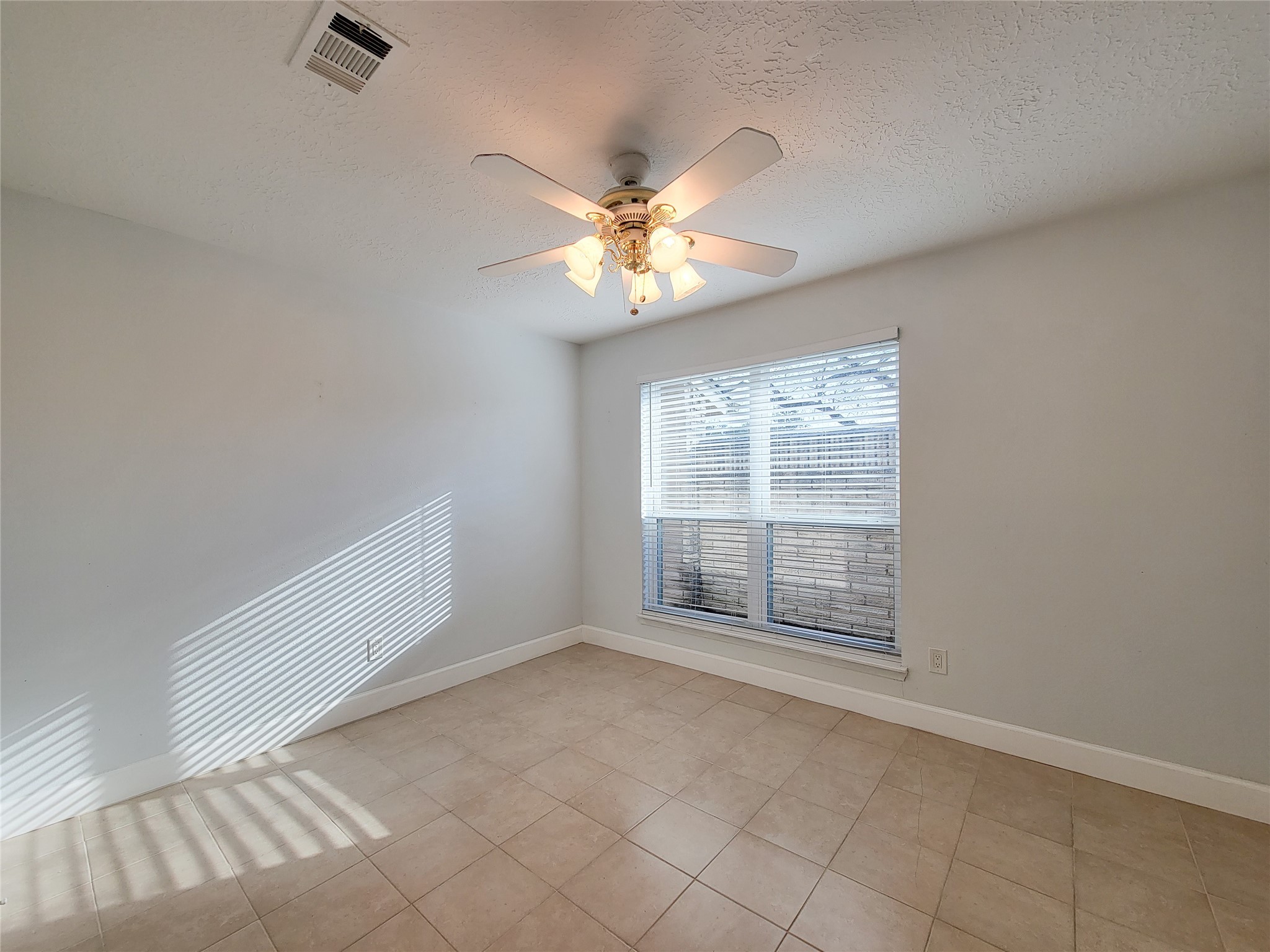 3434 Almondwood Drive Spring, TX 77389 - Photo 15 of 37 a view of an empty room with a window