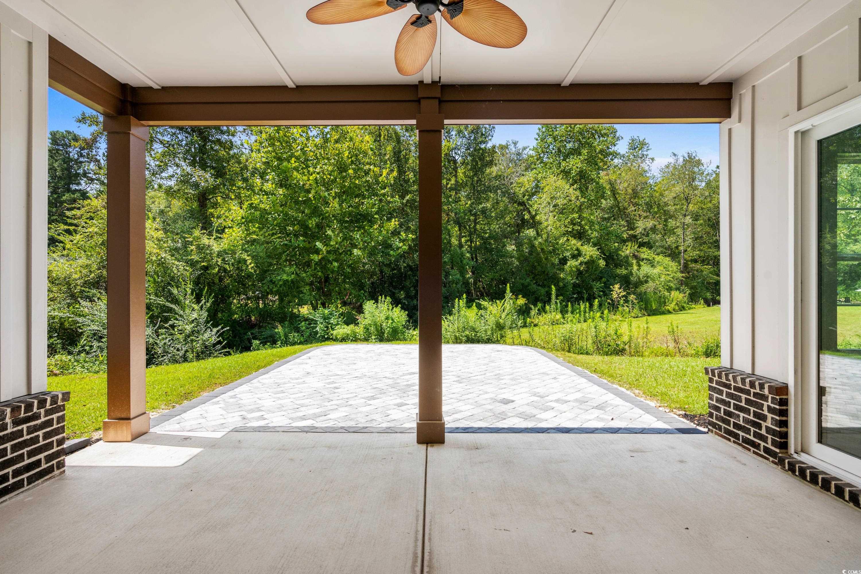 232 Ole Maple Street Loris, SC 29569 - Photo 16 of 40 View of patio with a ceiling fan