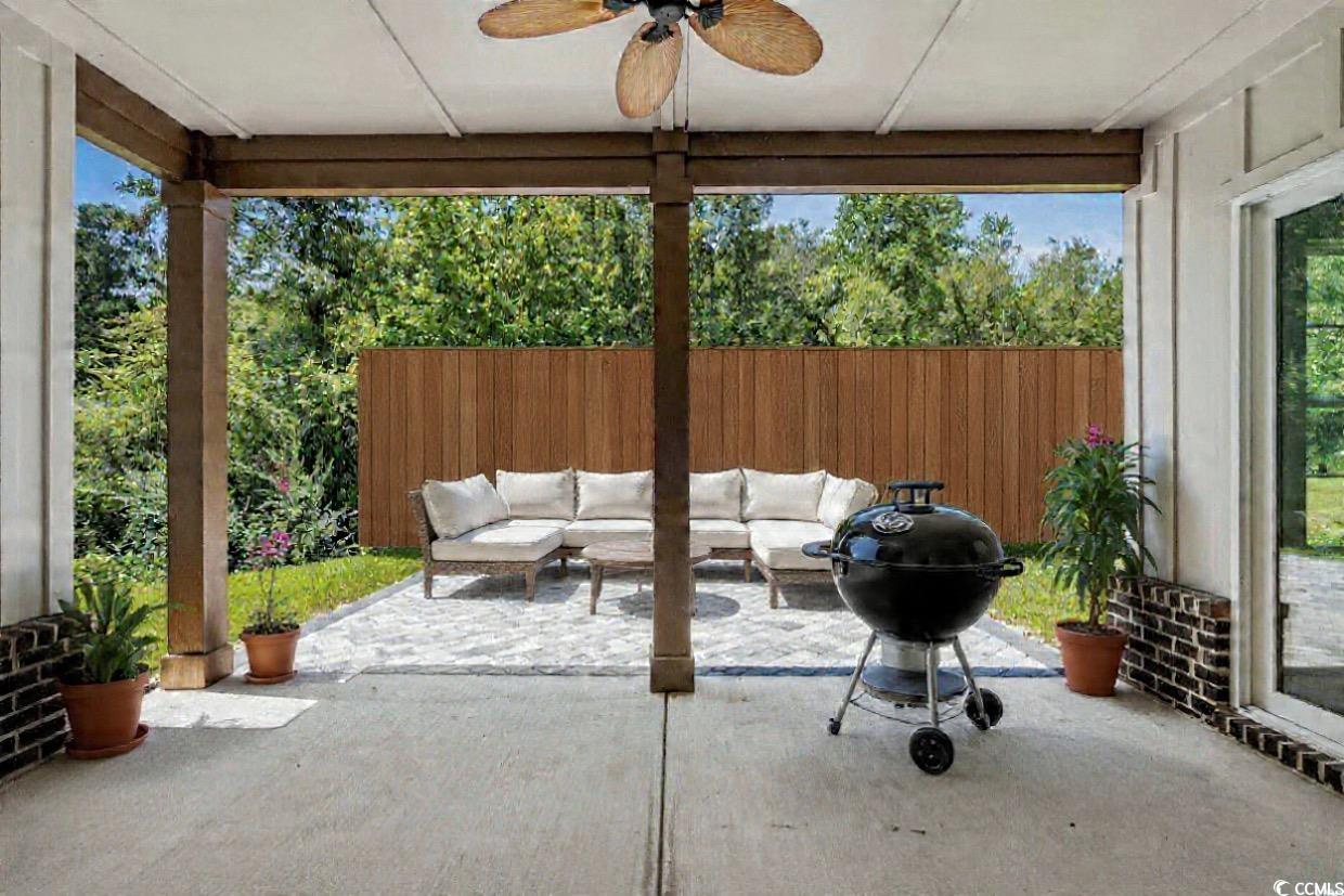 232 Ole Maple Street Loris, SC 29569 - Photo 17 of 39 View of patio featuring a ceiling fan, a grill, and outdoor lounge area