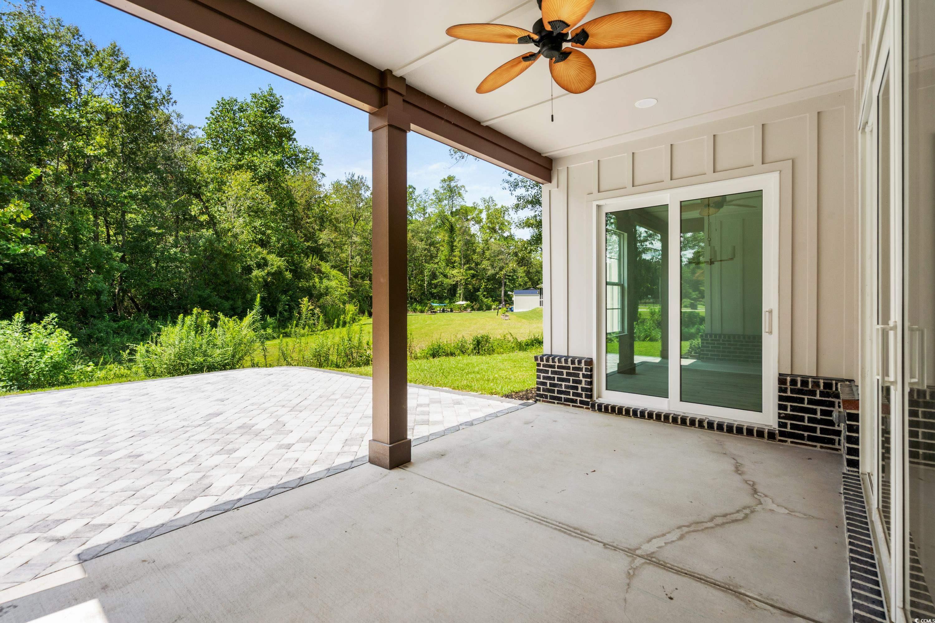 232 Ole Maple Street Loris, SC 29569 - Photo 17 of 40 View of patio / terrace with ceiling fan