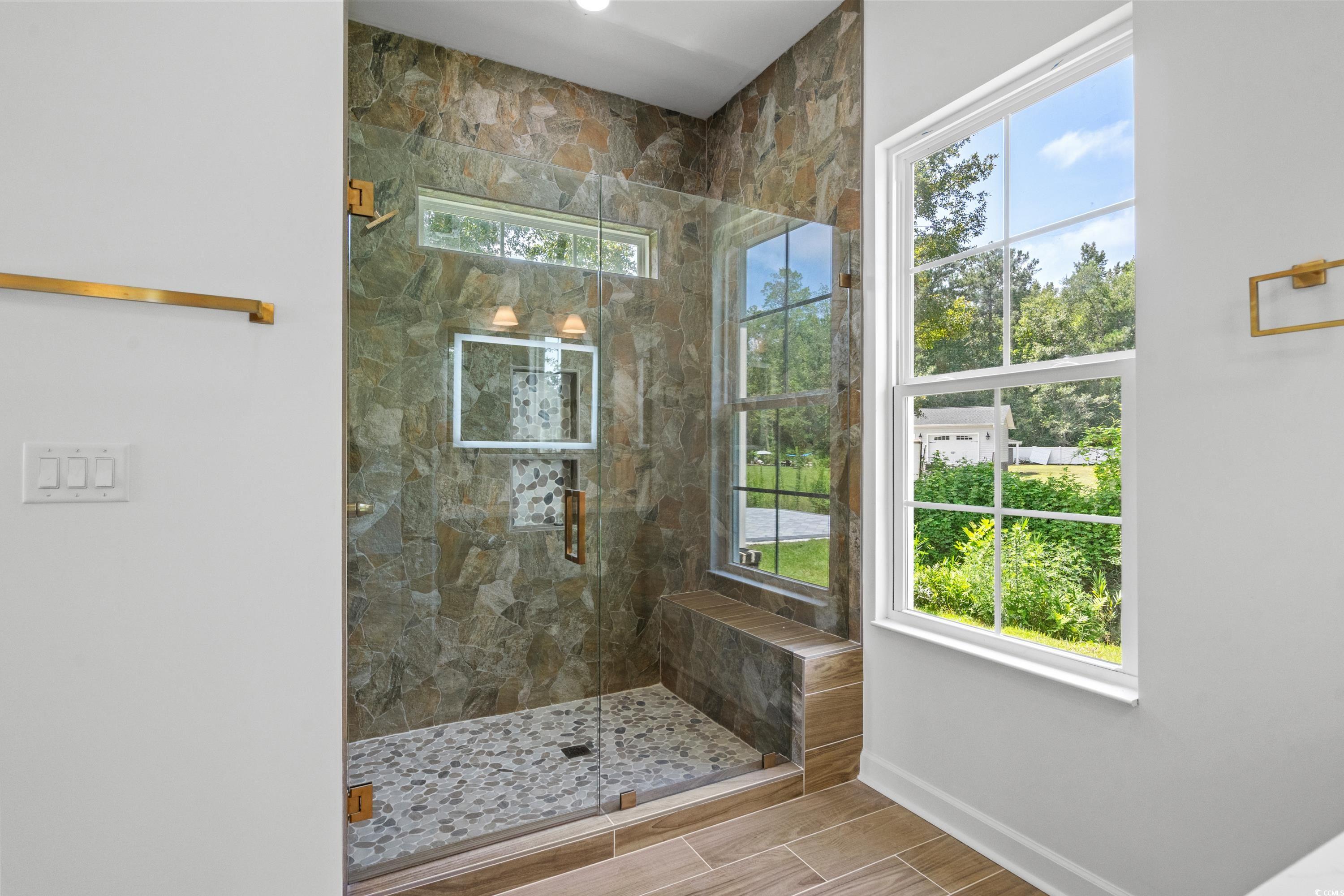 232 Ole Maple Street Loris, SC 29569 - Photo 29 of 40 Full bath with a marble finish shower and wood finish floors