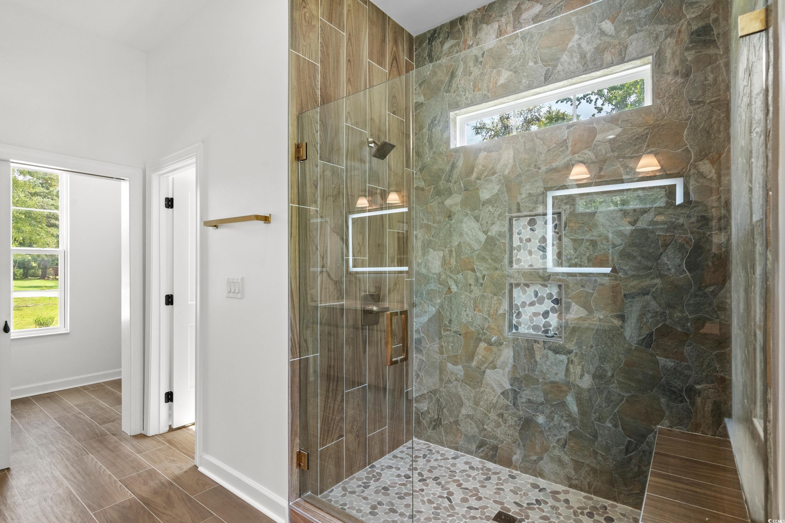 232 Ole Maple Street Loris, SC 29569 - Photo 30 of 40 Bathroom with a shower stall and wood finish floors