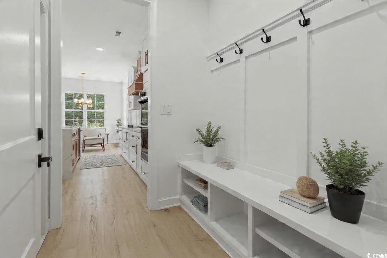 232 Ole Maple Street Loris, SC 29569 - Photo 32 of 39 Mudroom with light wood-style floors, recessed lighting, and a chandelier
