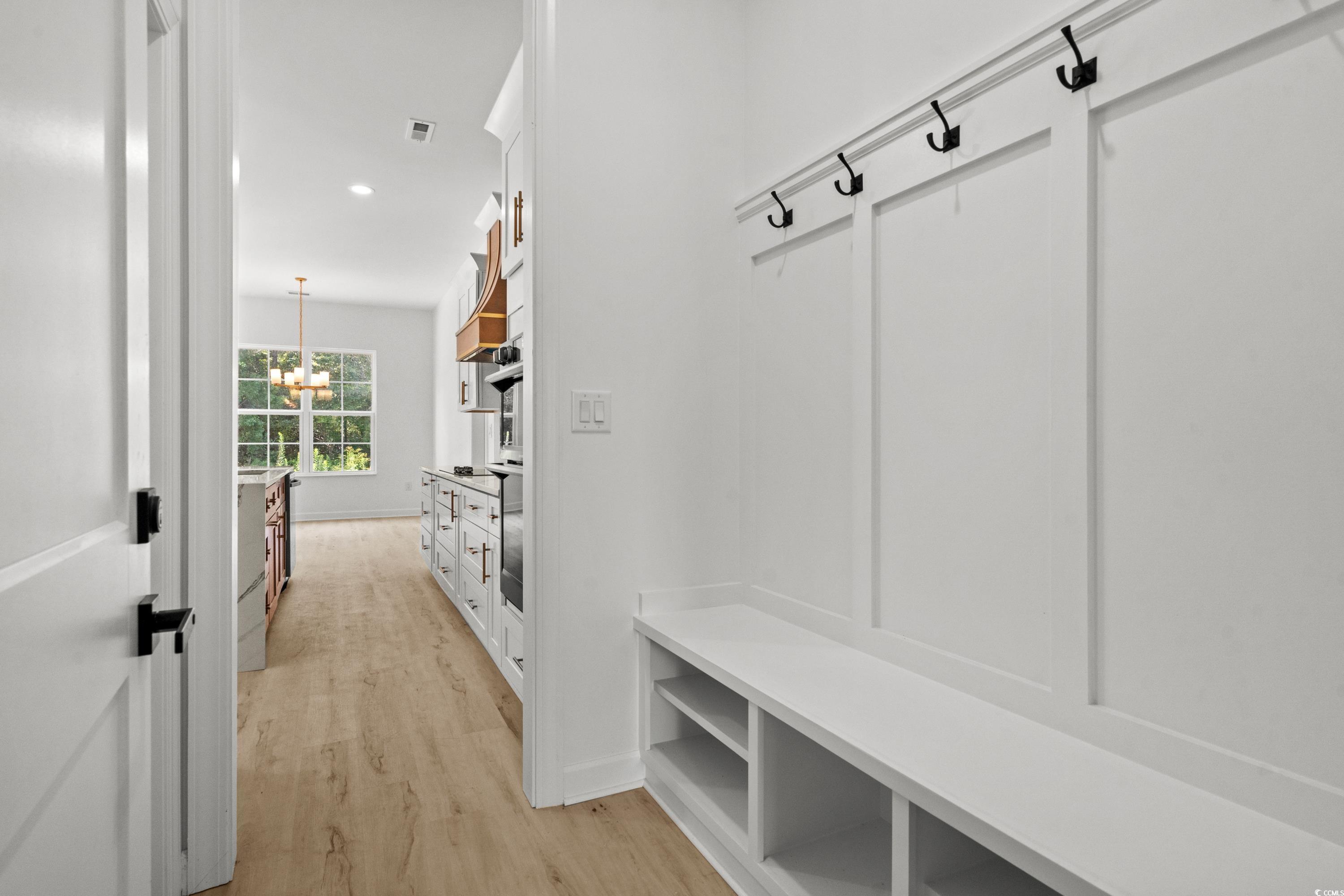 232 Ole Maple Street Loris, SC 29569 - Photo 32 of 40 Mudroom with light wood-style floors, a chandelier, and recessed lighting