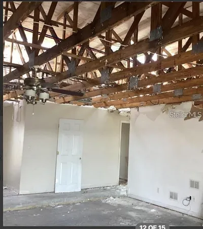 a view of a house with a tree