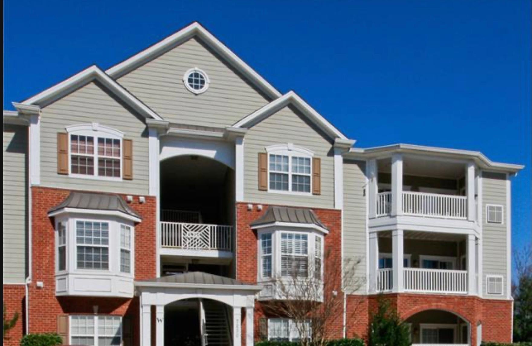 7230 Althorp Way, Unit W7 Nashville, TN 37211 - Photo 1 of 21 a front view of a house with a yard